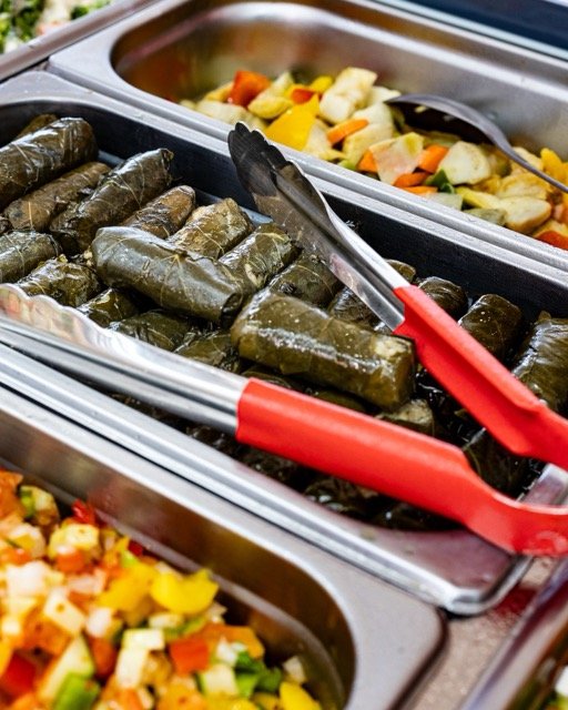 Amir food photography showing a chicken shawarma plate.